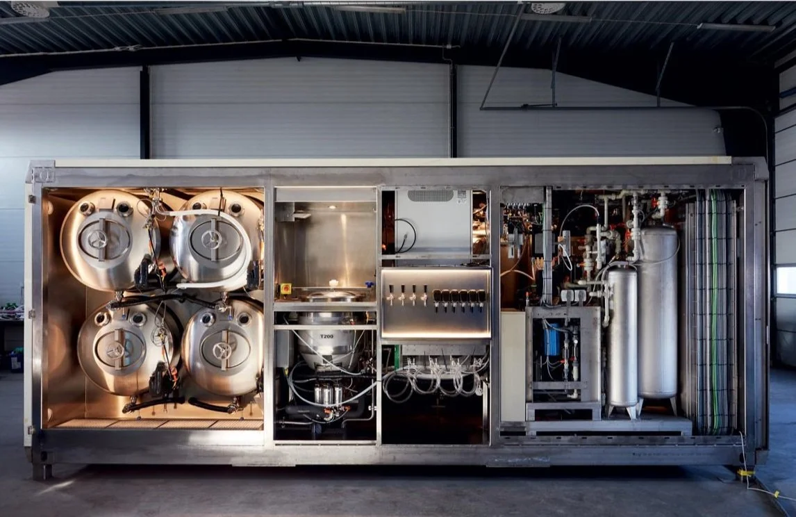 Vacuum evaporation system recovering process water at an industrial site